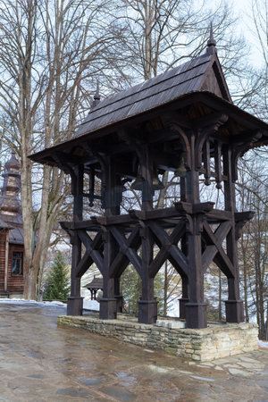 The former Lemko Greek-Catholic wooden church of St. Kosmas and Damian in Wojkowa from 1790, tower bell. The Malopolska wooden architecture trail.の写真素材
