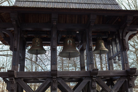 The former Lemko Greek-Catholic wooden church of St. Kosmas and Damian in Wojkowa from 1790, tower bell. The Malopolska wooden architecture trail.の写真素材
