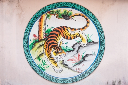 Wall painted with image of tiger in chinese temple, Chonburi, Thailand の写真素材