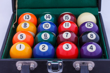 Openned case of pool ball, There are ball number one to fifteen togehter with white ball in case の写真素材