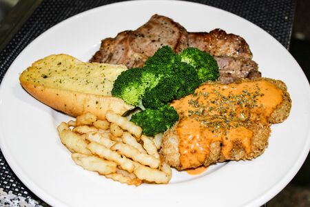 Conbination steak pork and fish.
