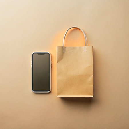 Mobile phone and brown paper bag, placed on a beige surface, viewed from directly aboveの素材