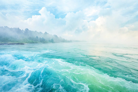 Misty river, cloudy sky, tranquil scene, nature background, travelの素材