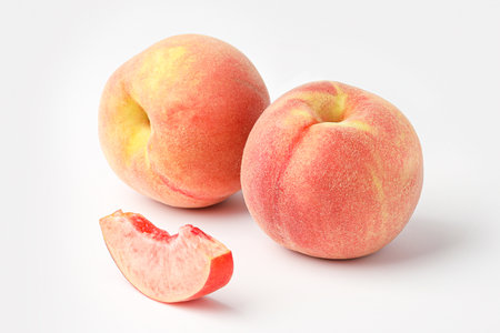 peach isolated on white backgroundの写真素材
