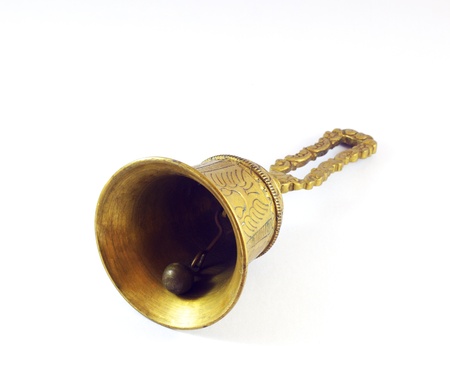 Bronze bell isolated on whiteの写真素材