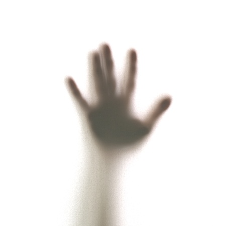 Mystic silhouette of man asking for helpの写真素材