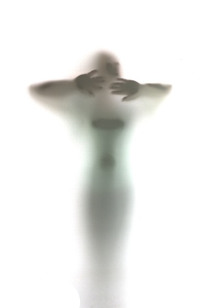 Mystic silhouette of man asking for helpの写真素材