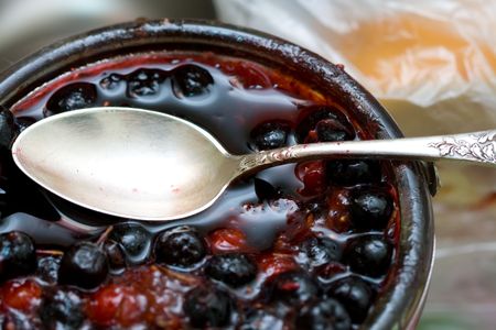 bowl with berries and a spoon