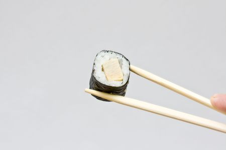 sushi and chopsticks on the neutral backgroundの写真素材