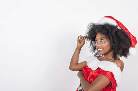 cheerful family laughing surrounded by confetti over a pink background, horizontal pictureの写真素材