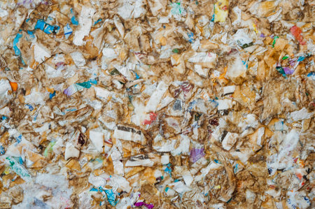 plywood textured background made from different types of recycled material, copy space.の写真素材