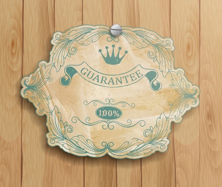 vintage label on the wooden background のイラスト素材