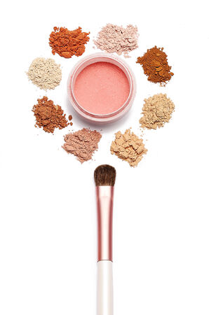 make up powder sweet color and brush on white backgroundの写真素材