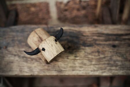 The Wooden Buffalo on woods at the gardenの写真素材
