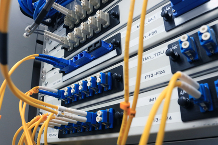 Network cable and switch,Data Center in Server room concept.の写真素材