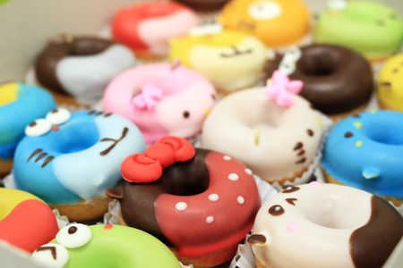 Collection of lovely cute cake donut for children birthday partty, Cartoon childlike character doughnuts for kids, Lovely snacks.の写真素材