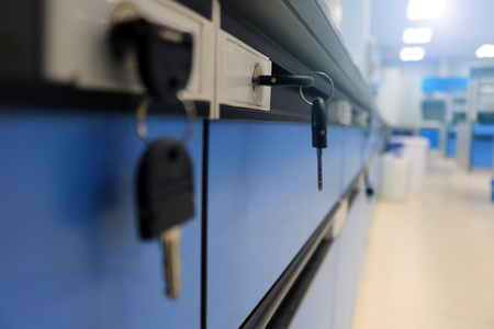 Close-up cabinet key in science laboratory classroom.の写真素材