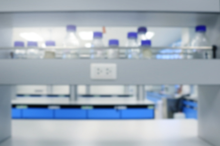 Reagent bottles or glass bottles with chemical on shelf of science classroom and laboratory.の写真素材