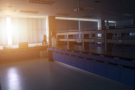 Laboratory interior dark room with morning sunrise blur image use for background.の写真素材