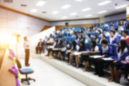 Teacher pedagogy student in classroom of university. - Education or seminar concept blur image use for background.の写真素材