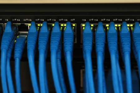 Lan cable network   connect to switch, Data center in server room computer concept.の写真素材