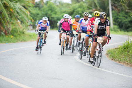 SURATTHANI, THAILAND - JULY 10: Unidentified riders in action during "Suratthani Bike Race 2013" on July 10, 2013 in Suratthani, Thailand. It is a free, open, and un-ticketed event.のeditorial素材
