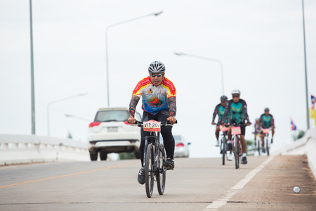 SURATTHANI, THAILAND - JULY 10: Unidentified riders in action during "Suratthani Bike Race 2013" on July 10, 2013 in Suratthani, Thailand. It is a free, open, and un-ticketed event.のeditorial素材