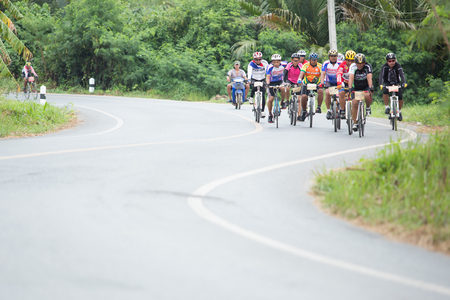 SURATTHANI, THAILAND - JULY 10: Unidentified riders in action during "Suratthani Bike Race 2013" on July 10, 2013 in Suratthani, Thailand. It is a free, open, and un-ticketed event.のeditorial素材