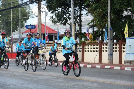 SURAT THANI, THAILAND - AUGUST 16 : Unidentified riders in action during "Bike for Mom event" on August 16, 2015 in Surat Thani, Thailand. Bike for Mom is the event for celebrates queen's birthday.のeditorial素材