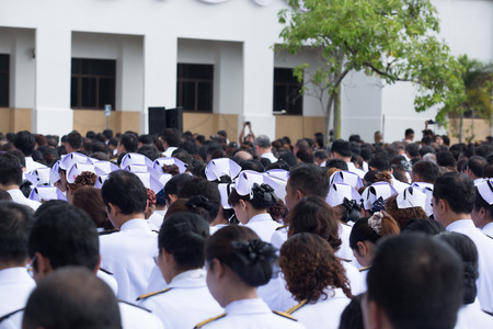 SURATTHANI, THAILAND - OCTOBER 16 : Crowds of mourners during Mourning Ceremony of King Bhimibol pass away at Suratthani City Hall on October 16, 2016 in Suratthani, Thailand.のeditorial素材