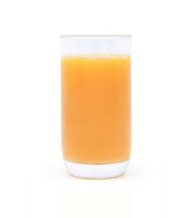 Close-up of Glass squeezed orange juice, yellow color isolated on white background. Organic tropical fruit drink from natural. Concept food is vegetarian for a healthy.の写真素材