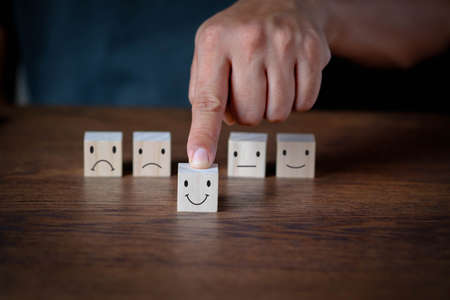 Customer service and Experience satisfaction evaluation concept. Image of Customer man hand choose...
