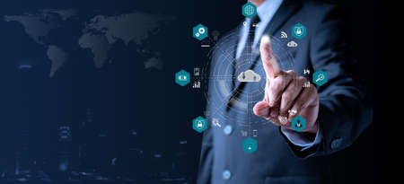 Businessman showing hologram, analyzing sales data and economic. Analysis strategy sale marketing economic data online network connection. Business finance and marketing digital technology concept.の写真素材