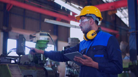 Professional maintenance engineer, technician worker, repairman wear uniform, safety hard hat using...