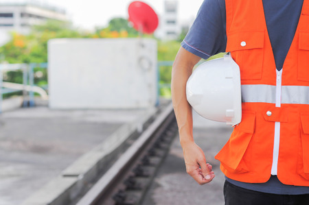 security of the person and the background for the railroad.の写真素材