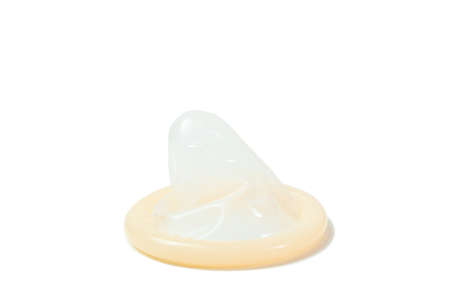 Cream color Condom with light blue package on white background. Sex protect concept.の写真素材