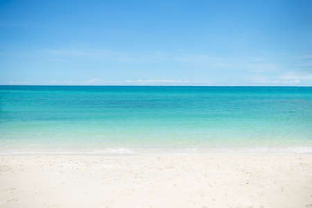 Beautiful wide of seascape with blue sky at daylight. Sand of beach smooth Sea.の写真素材