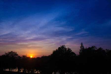 Silhouette sunset in thailandの写真素材