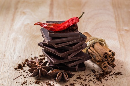 Stack of Dark Chocolate with Different Spicesの写真素材