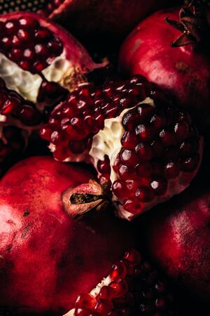 Background of ripe and red pomegranate fruitの写真素材