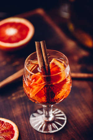 Orange whiskey sour cocktail with bourbon, blood orange juice and simple syrupの写真素材