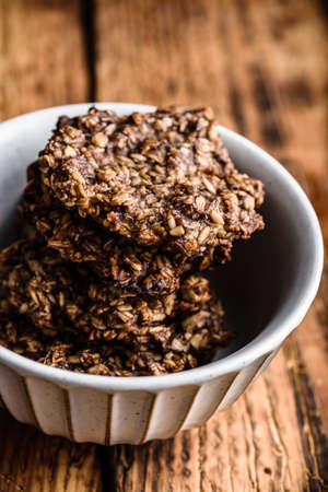 Banana oatmeal cookies with chocolate spread in bowlの写真素材