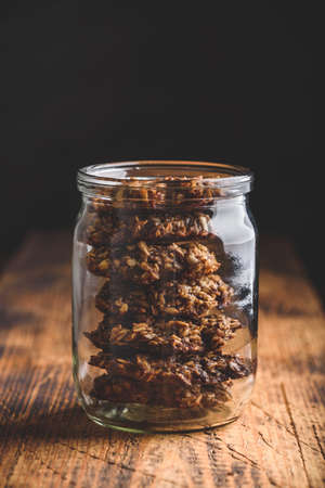 Banana oatmeal cookies with chocolate spread in jarの写真素材