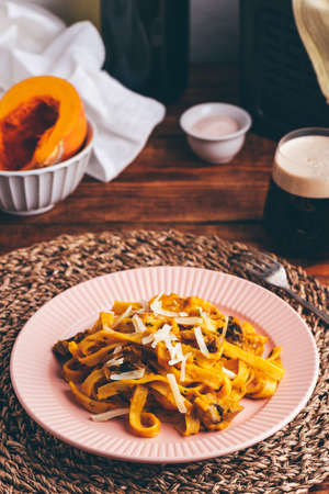 Portion of Pumpkin Pasta with Sour Cream and Mushroomsの写真素材