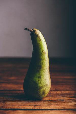 Still Life with Conference Pear on Wooden Tabletopの写真素材