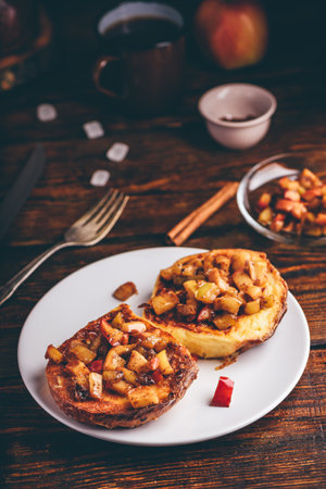 French toasts with apple caramelized with cinnamonの写真素材