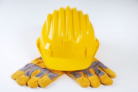 YELLOW HARD HAT AND WORK GLOVES の写真素材