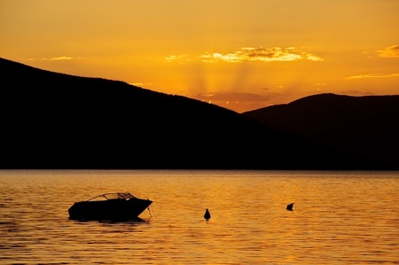 Sunset with boat の写真素材