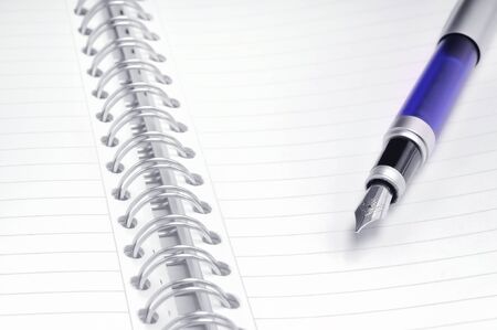 Notebook and a pen の写真素材