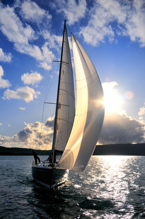 Sailing yacht in back lit 